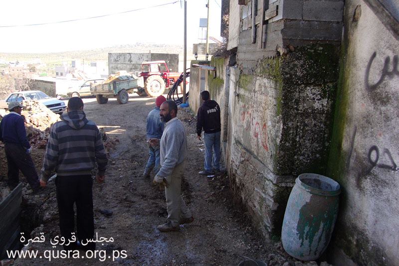 توسعة احد الشوارع الضيقة وسط القرية ( 2 )